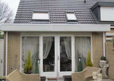 Uitbouw openslaande deuren met overstek